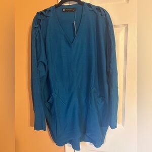 NWT blue-green tunic sweater by NY&Co. It’s in a women’s size large.